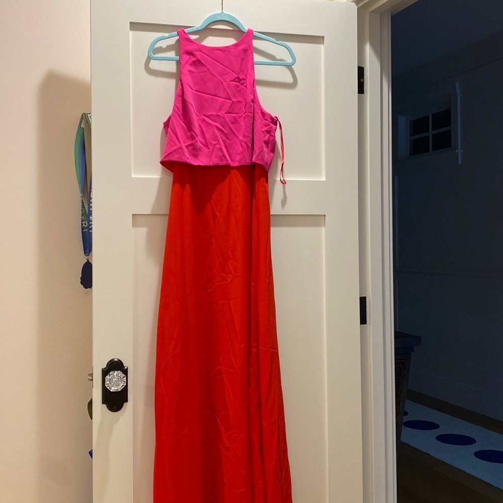 Jill Stuart size 12, new with tags. Color block with small back opening.